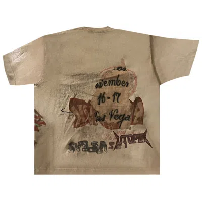 CACTUS JACK BY TRAVIS SCOTT CACTUS JACK BY TRAVIS SCOTT X COMPLEXCON TEE 'BROWN'