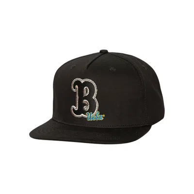 CACTUS JACK BY TRAVIS SCOTT CACTUS JACK BY TRAVIS SCOTT X MITCHELL & NESS UNIVERSITY OF CALIFORNIA, LOS ANGELES HAT 'BLACK'