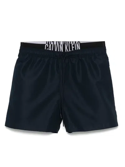 CALVIN KLEIN DOUBLE-WAISTBAND SWIM SHORTS
