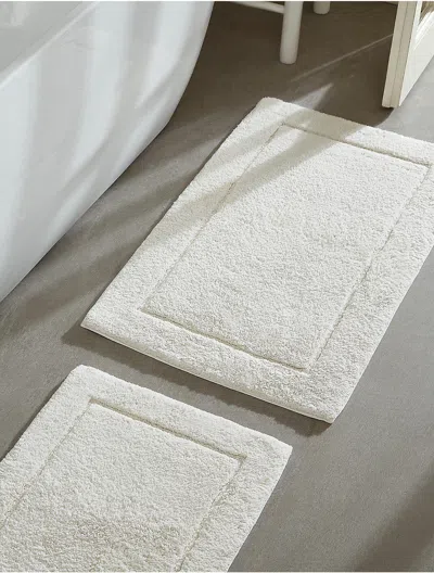 CALVIN KLEIN ESSENCE SOLID TUFTED 2-PACK BATH RUG SET