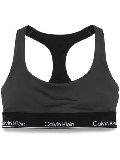 CALVIN KLEIN LOGO-WAISTBAND SPORTS BRA