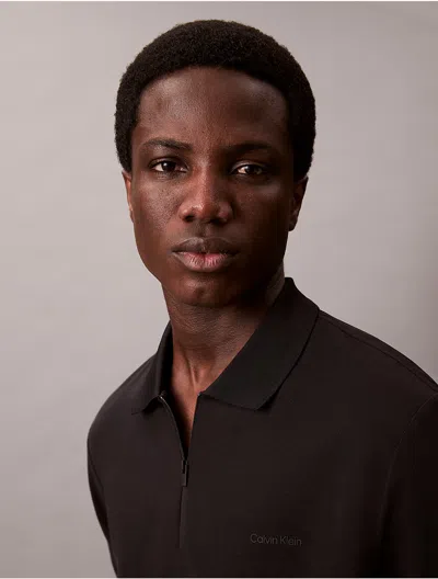 CALVIN KLEIN MEN'S TECH ZIP POLO SHIRT