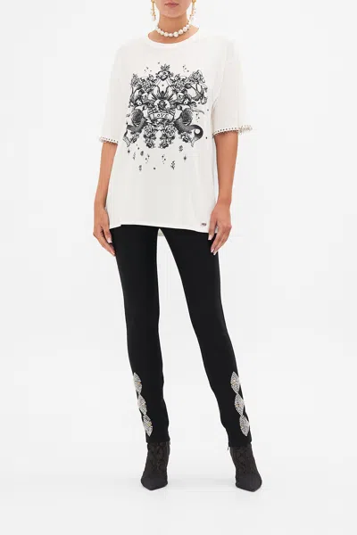 CAMILLA OVERSIZED BAND TEE WITH HARDWARE DETAIL TALES OF TATTOO