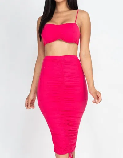 CAPELLA SAVAGE TUBE TOP AND MIDI SKIRT SET IN FUCHSIA