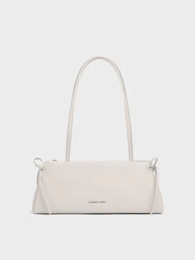 CHARLES & KEITH CHARLES & KEITH - HAZEL BOW ELONGATED TRAPEZE SHOULDER BAG