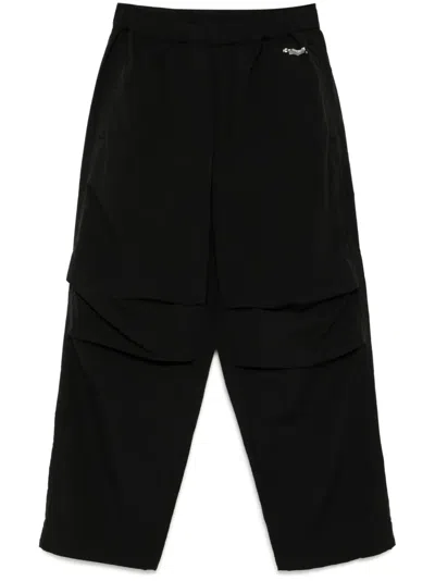 CHOCOOLATE LOGO-PRINT TROUSERS