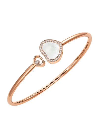 CHOPARD ROSE GOLD, DIAMOND AND MOTHER-OF-PEARL HAPPY DIAMONDS BANGLE