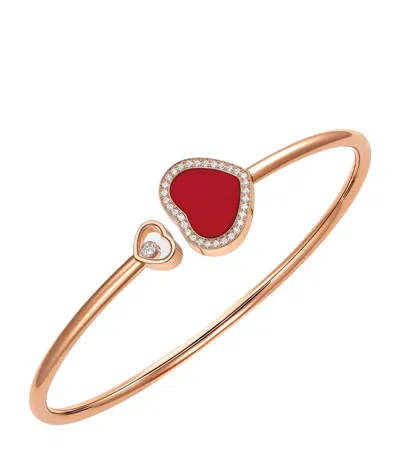 CHOPARD ROSE GOLD, DIAMOND AND RED STONE HAPPY HEARTS BANGLE