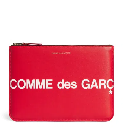COMME DES GARÇONS LARGE LEATHER LOGO POUCH