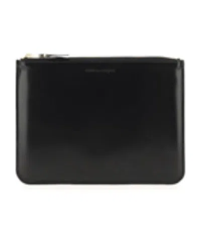 COMME DES GARÇONS LOGO CLUTCH