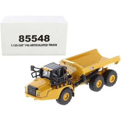 DIECAST MASTERS ARTICULATED DUMP TRUCK HIGH LINE SERIES 1 BY 125 DIECAST MODEL CAR FOR CAT CATERPILLAR 745