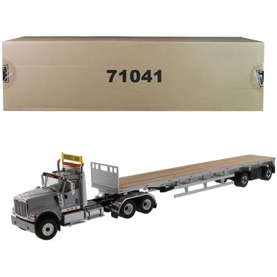 DIECAST MASTERS INTERNATIONAL HX520 TANDEM TRACTOR LIGHT GRAY WITH 53 FT. FLAT BED TRAILER TRANSPORT SERIES 1 BY 50 