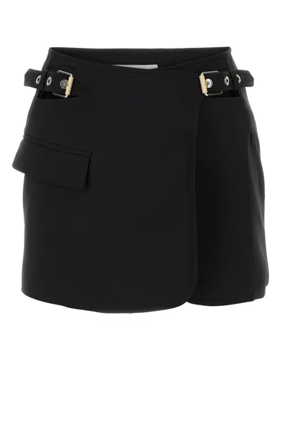 DION LEE BLACK STRETCH POLYESTER BLEND MINI SKIRT