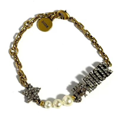 DIOR ARTIFICIAL IVORY METAL RHINESTONE CHARM BRACELET (PRE-OWNED)