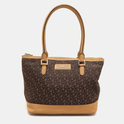 DKNY BROWN/TAN CANVAS AND LEATHER ZIP TOTE