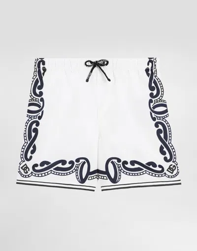 DOLCE & GABBANA FABRIC SWIM TRUNKS WITH BANDANNA PRINT