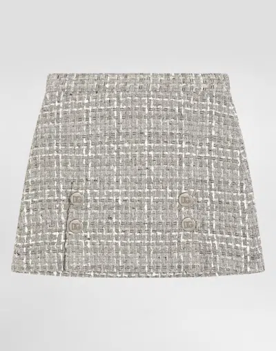 DOLCE & GABBANA LAMÉ BOUCLÉ SKIRT WITH DECORATIVE BUTTONS