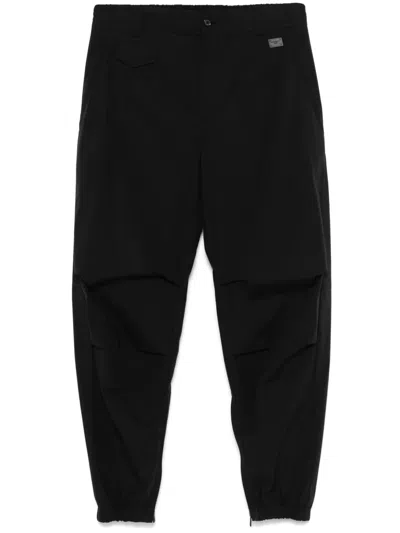 DOLCE & GABBANA LOGO-PLAQUE TAPERED TROUSERS
