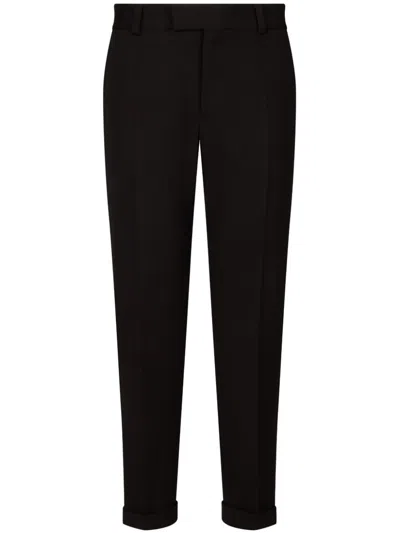 DOLCE & GABBANA PRESSED-CREASE TAPERED TROUSERS