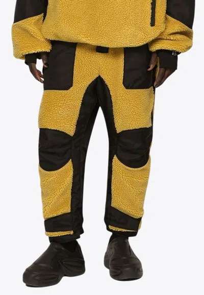 DOLCE & GABBANA TECH AND SHEARLING TRACK PANTS