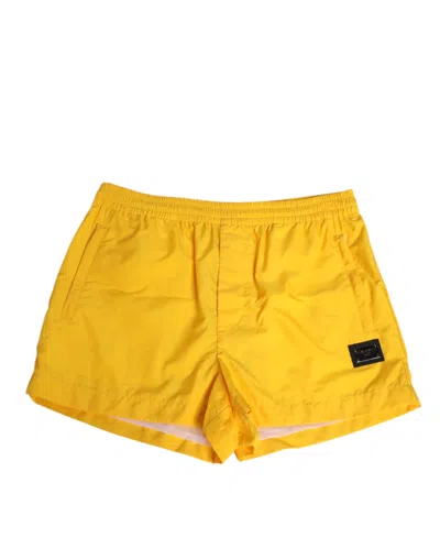 DOLCE & GABBANA YELLOW NYLON LOGO PLAQUE BOXER SHORTS SWIMWEAR