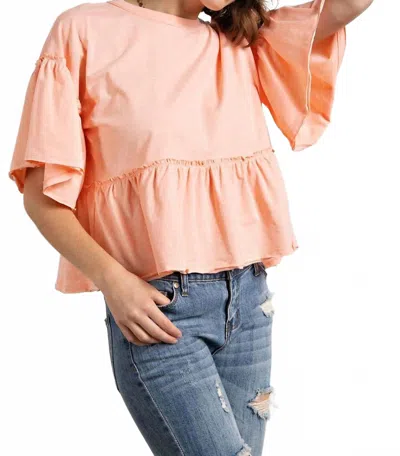 EASEL RUFFLE BABYDOLL TOP IN PEACH