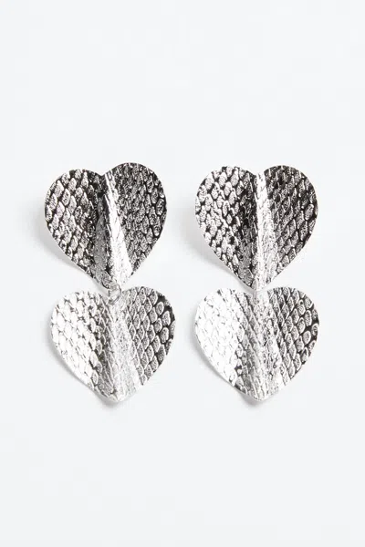 EKLEXIC SMALL HEATHROW EARRINGS IN SILVER