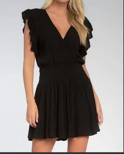 ELAN SMOCK WAIST DRESS IN BLACK