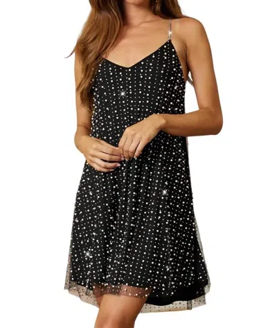 ENDLESS BLU. CROSS BACK PEARL MINI DRESS IN BLACK