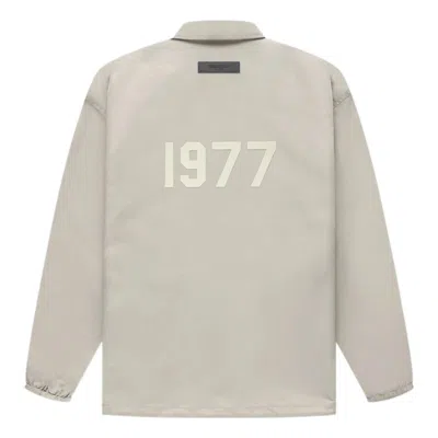 ESSENTIALS Fear of God Essentials FW22 1977 Nylon Coaches Jacket