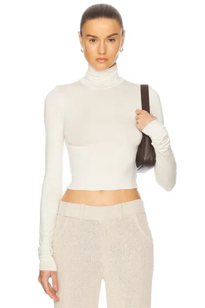 ÉTERNE CROPPED FITTED TURTLENECK SOFT JERSEYTOP