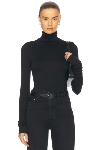 ÉTERNE FITTED TURTLENECK TOP