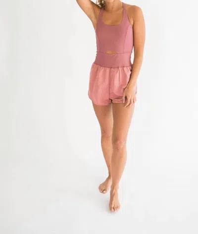 FALCON PARK JOY CUTOUT ATHLETIC ROMPER IN MAUVE