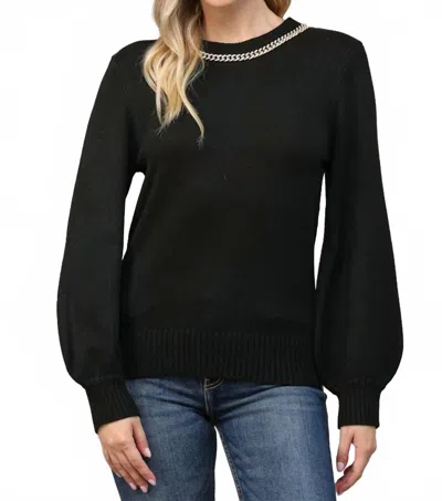 FATE CHAIN TRIMMED OPEN BACK SWEATER IN BLACK