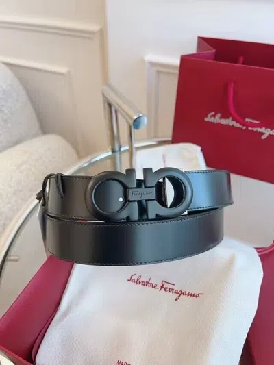 FERRAGAMO SALVATORE FERRAGAMO REVERSIBLE BLACK AND BROWN BELT BLACK BUCKLE SIZE 105/42
