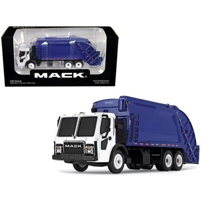 FIRST GEAR MACK LR WITH MCNEILUS REAR LOAD REFUSE BODY BLUE & WHITE 1-87 SCALE HO DIECAST MODEL