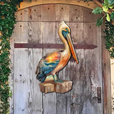 G. DEBREKHT COASTAL PELICAN OUTDOOR DOOR DECOR BY G. DEBREKHT