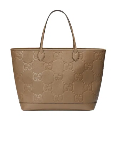GUCCI GUCCI ALL-OVER LOGO EMBOSSED SHOPPER TOTE BAG