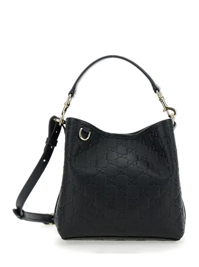 GUCCI GUCCI WOMEN 'ARABELLA' BLACK SHOULDER BAG WITH ALL-OVER GG EMBROIDERY AND ADJUSTABLE AND REMOVABLE S