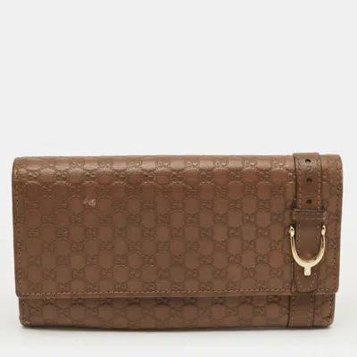 GUCCI BROWN MICROGUCCISSIMA LEATHER NICE FLAP CONTINENTAL WALLET