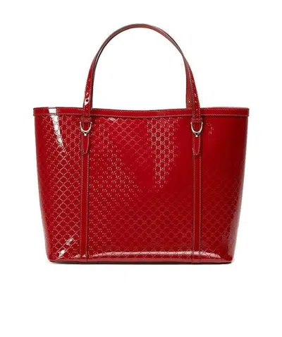 GUCCI EMBOSSED HANDBAG