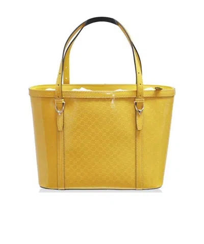 GUCCI EMBOSSED HANDBAG