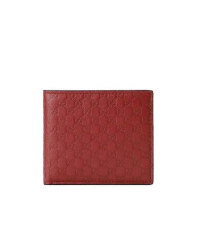 GUCCI EMBOSSED SHORT WALLET