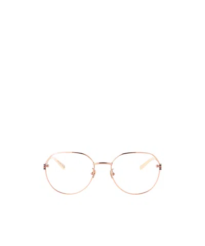GUCCI GUCCI EYEWEAR OVAL FRAME GLASSES