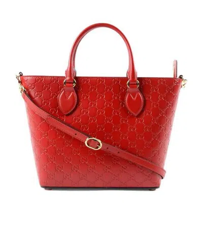 GUCCI GG LOGO EMBOSSED HANDBAG