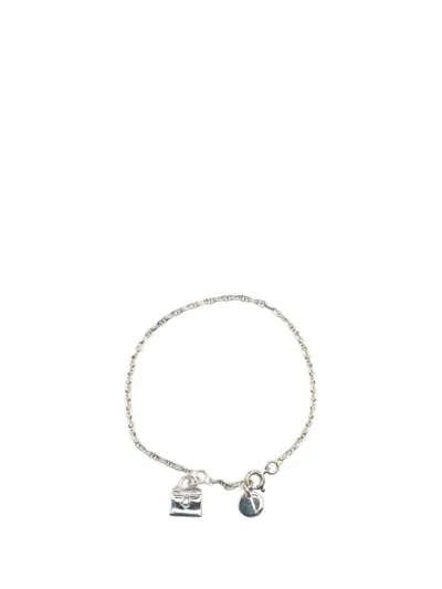 HERMES 21ST CENTURY STERLING SILVER KELLY CHARM COSTUME BRACELET