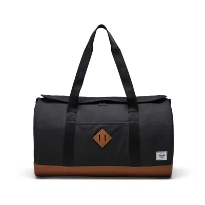 HERSCHEL UNISEX HERITAGE DUFFLE BAG BLACK/SADDLE BROWN