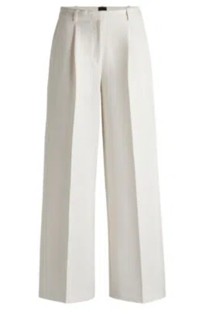 HUGO BOSS BOOT-LEG TROUSERS IN STRETCH FABRIC