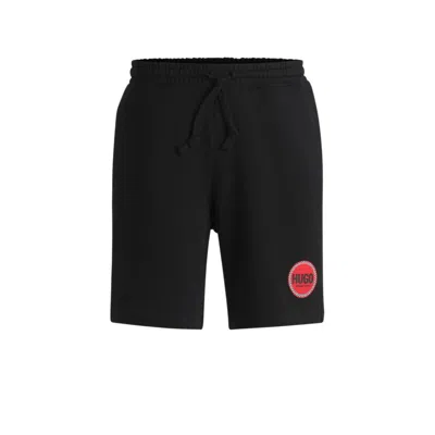 HUGO BOSS COTTON-TERRY RELAXED-FIT SHORTS WITH LOGO PRINT