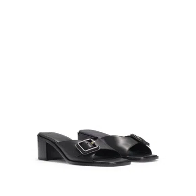 HUGO BOSS LEATHER MULES WITH BUCKLE DETAIL